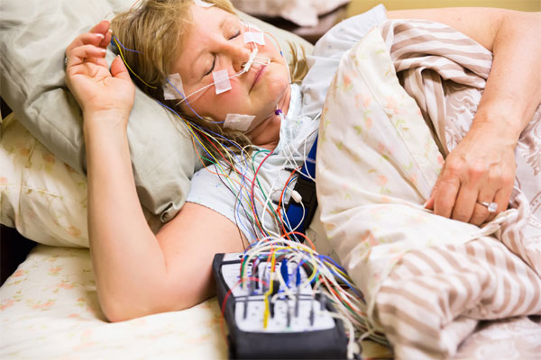 Woman Undergoing Home Sleep Study